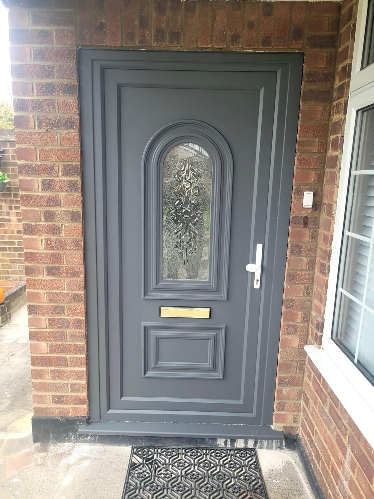 The same front door after respraying in anthracite grey