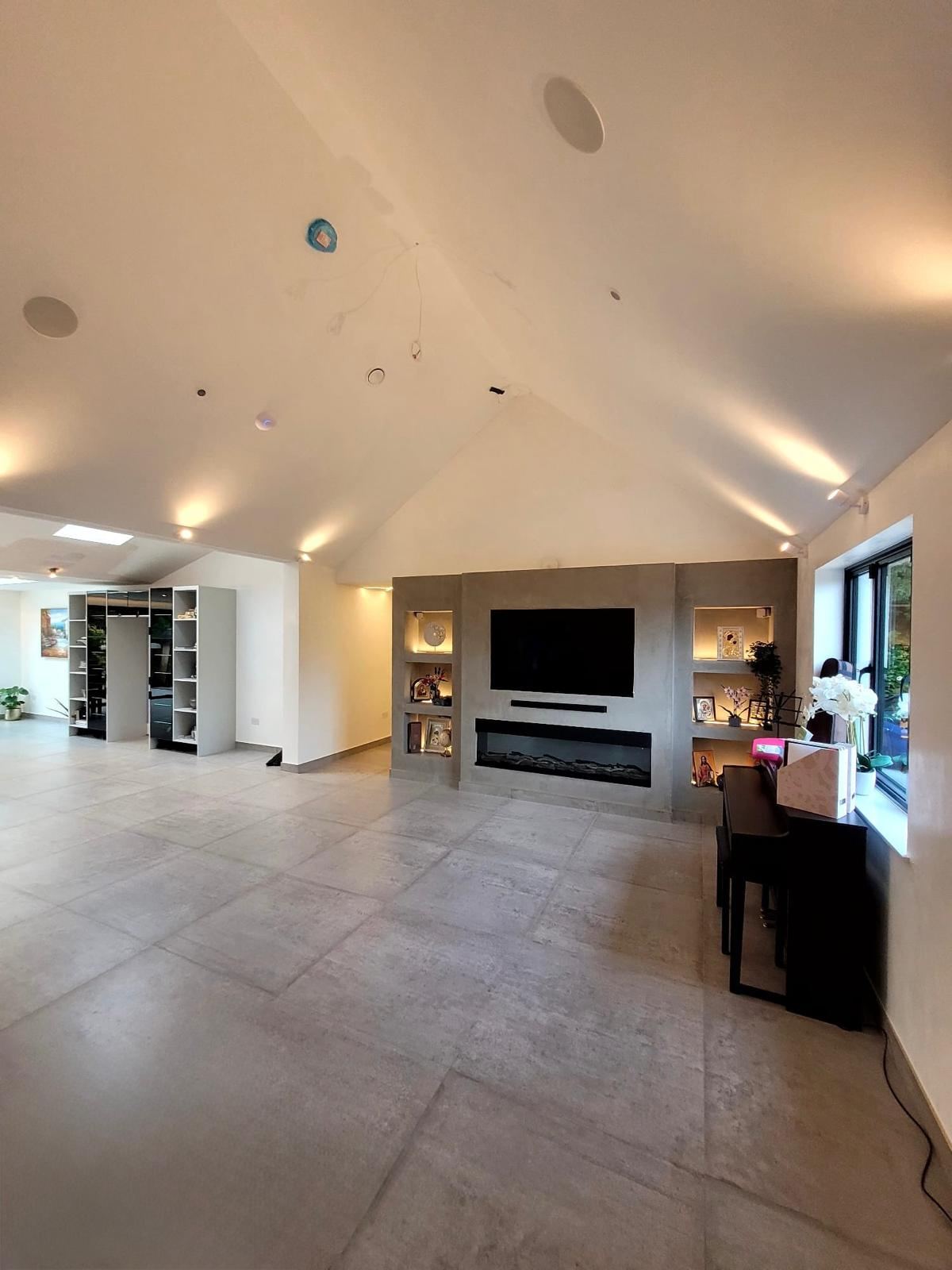 Decorated living room with vaulted ceiling in a London home